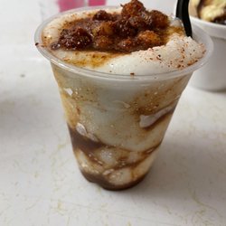 Nitty’s Italian Ice - Lemon ice with Tajin and chamomile! Top with coated lemon heads!