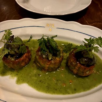 St Lawrence Restaurant - Escargot in a puff pastry topped with a garlic parsley butter - French Near Me - Vancouver, British Columbia St Lawrence Restaurant - Escargot in a puff pastry topped with a garlic parsley butter - French Near Me - Vancouver, British Columbia