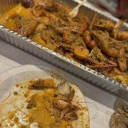 Crab King Cajun Boil & Bar - Shrimp Head Off, Langostinos, Mussel Green, Eggs, Seasoned Corn, Sausage, Potatoes and noodles.