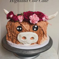 Petite Sakura - Custom Cake - Highland Cow Baby Shower Cake! A delicious vanilla cake layered with smooth vanilla buttercream.