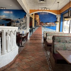 The Greek Islands - Booth seating by the front window.