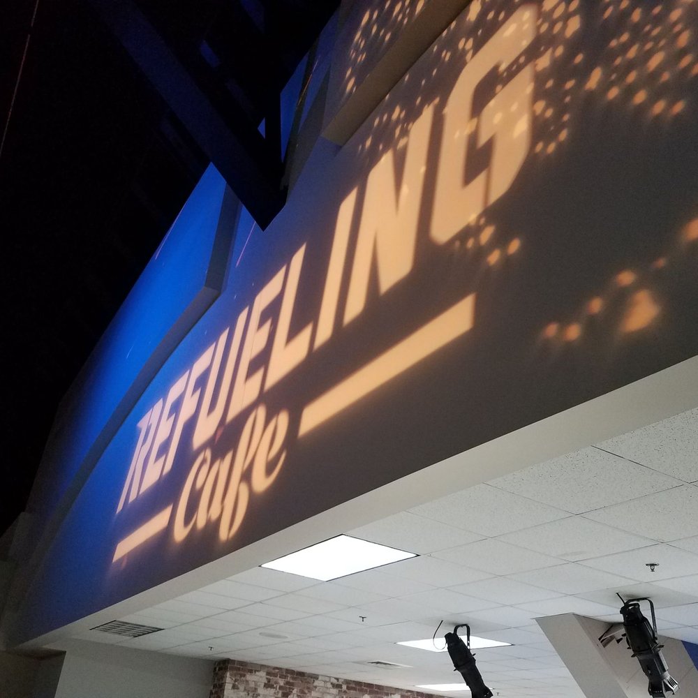 Refuelling Cafe - a shadow of a clock on the wall - Themed Cafes Near Me - Riverside, Ohio