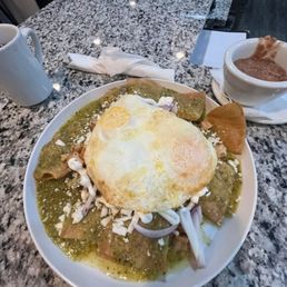Chilaquiles with side of beans. Great flavor! Chilaquiles with side of beans. Great flavor!