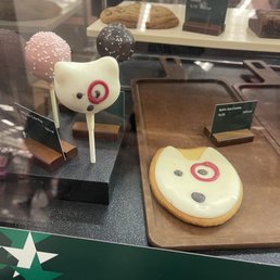 a display case with a variety of desserts a display case with a variety of desserts
