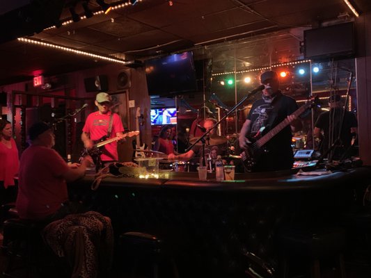 Photo of The Fling - Santa Ana, CA, US. a band playing at a bar