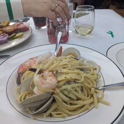 Shrimp and clams in wine and garlic.