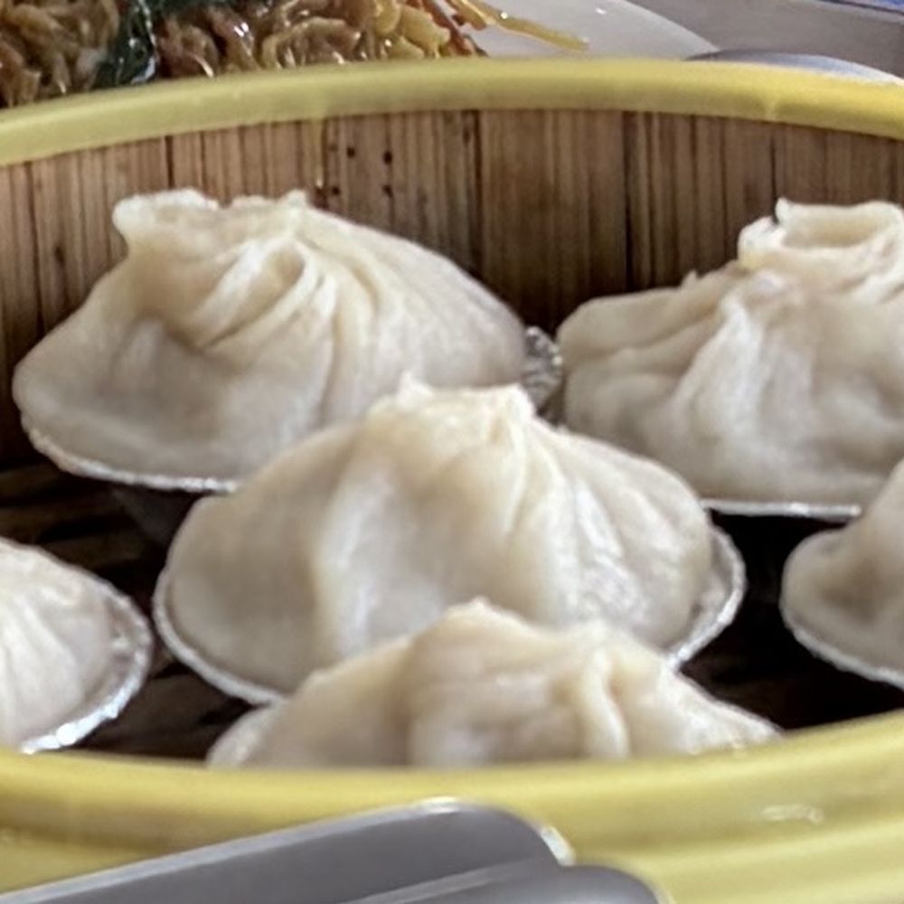 Fook Lam - Xiao Long Bao --- cooked in a muffin pan. Soup was tasty but I don't believe they used the right wrapper. Great attempt. - Dim Sum Near Me - Honolulu, Hawaii Fook Lam - Xiao Long Bao --- cooked in a muffin pan. Soup was tasty but I don't believe they used the right wrapper. Great attempt. - Dim Sum Near Me - Honolulu, Hawaii