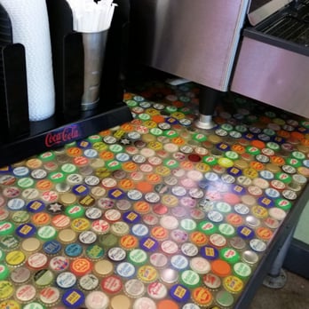 Nuttys junkyard Grill - Bottle cap counter - American Near Me - Arlington, Washington Nuttys junkyard Grill - Bottle cap counter - American Near Me - Arlington, Washington