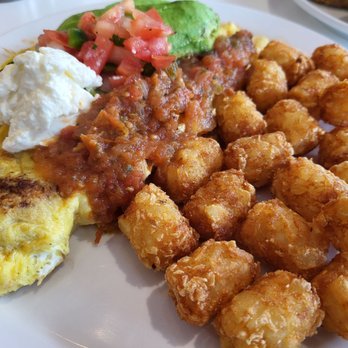 Over Easy - Surprise - Southwest omelet with tater tots - Breakfast & Brunch Near Me - Surprise, Arizona Over Easy - Surprise - Southwest omelet with tater tots - Breakfast & Brunch Near Me - Surprise, Arizona