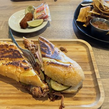 Cubanidad - The 305 sandwich aka the Miami Cuban, croquettes and plantain chips - Cuban Near Me - Henderson, Nevada Cubanidad - The 305 sandwich aka the Miami Cuban, croquettes and plantain chips - Cuban Near Me - Henderson, Nevada