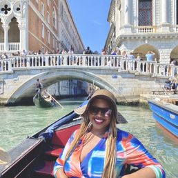 Taking the gondola through Canal Grande