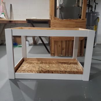 Al's Flooring & Handyman Services - a work area with a work bench and mirror - Flooring Near Me Al's Flooring & Handyman Services - a work area with a work bench and mirror - Flooring Near Me