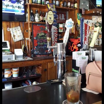 Huntt's Tavern - a bar with a television and a drink - Bars Near Me - Pomfret, Maryland Huntt's Tavern - a bar with a television and a drink - Bars Near Me - Pomfret, Maryland