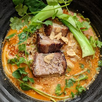 Motonobu Udon - Spicy TanTan: Braised Pork Belly, Shanghai Bok Choy, Green Onion, Cilantro, Chili Oil served with Chicken and Dashi Broth - Japanese Near Me - Vancouver, British Columbia Motonobu Udon - Spicy TanTan: Braised Pork Belly, Shanghai Bok Choy, Green Onion, Cilantro, Chili Oil served with Chicken and Dashi Broth - Japanese Near Me - Vancouver, British Columbia