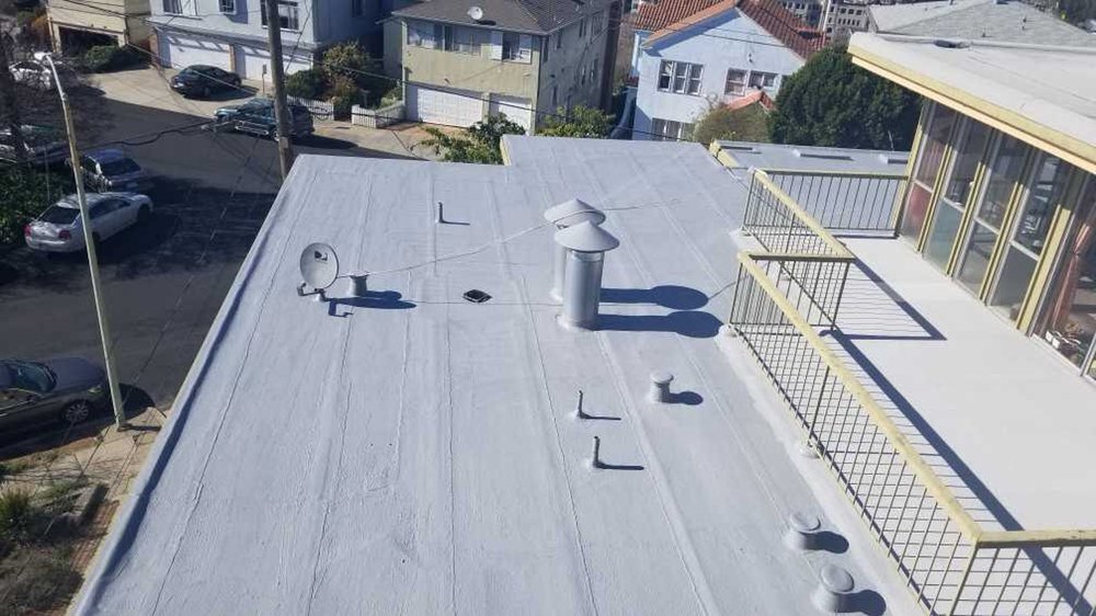 Slide of Flat Roofing Pros