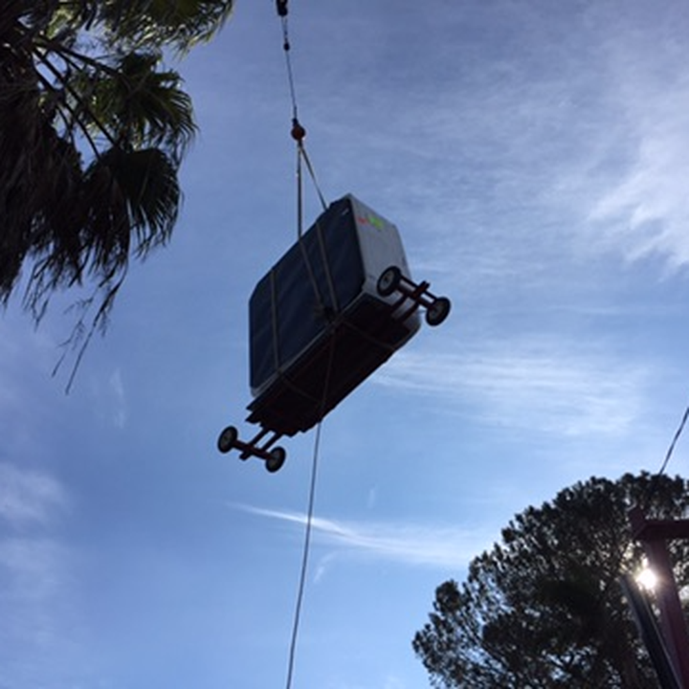 Lifting by crane over my house..