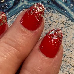 Angelie's Nails and Spa - Was wearing a red blouse with silver sequin dots.