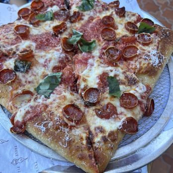 Truly Pizza - Classic Pepperoni pizza, panned cut in squares. - Pizza Near Me - Dana Point, California Truly Pizza - Classic Pepperoni pizza, panned cut in squares. - Pizza Near Me - Dana Point, California