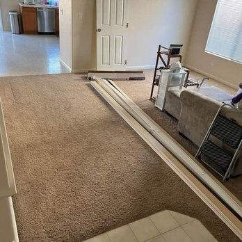 Abenoja Floors - So much carpet, random tile near the door & the kitchen was thin, off white, budget lenoleum. - Flooring Near Me