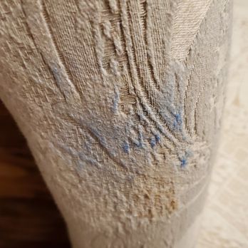 Boro Moving Company - Cream cloth chairs stained blue from blankets they were put on, no plastic wrap instead - Movers Near Me Boro Moving Company - Cream cloth chairs stained blue from blankets they were put on, no plastic wrap instead - Movers Near Me