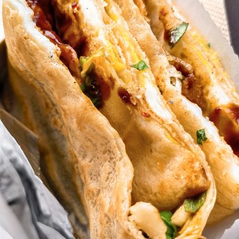 Bing Mi - a hot dog in a bun with cheese and ketchup - Food Trucks Near Me - Portland, Oregon Bing Mi - a hot dog in a bun with cheese and ketchup - Food Trucks Near Me - Portland, Oregon