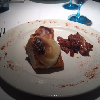 Yain - Salmón al gratén de ajos suaves. - Signature Cuisine Near Me - Teruel, TE
