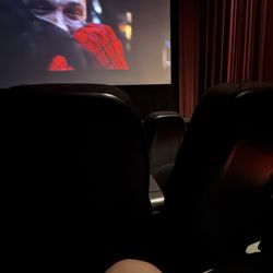 Canal Place Cinema - Pretty frustrating they don't dim the lights more. This is distracting and takes away from the movie theater experience