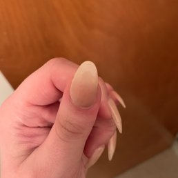 Tip of my thumb nail top coat chipped the day I got them done. Tip of my thumb nail top coat chipped the day I got them done.
