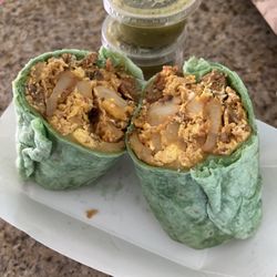 Lahaina's - Half chorizo, half sausage breakfast burrito, extra green sauce