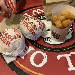 Two burgers, tots, two soft drinks - $40 Two burgers, tots, two soft drinks - $40