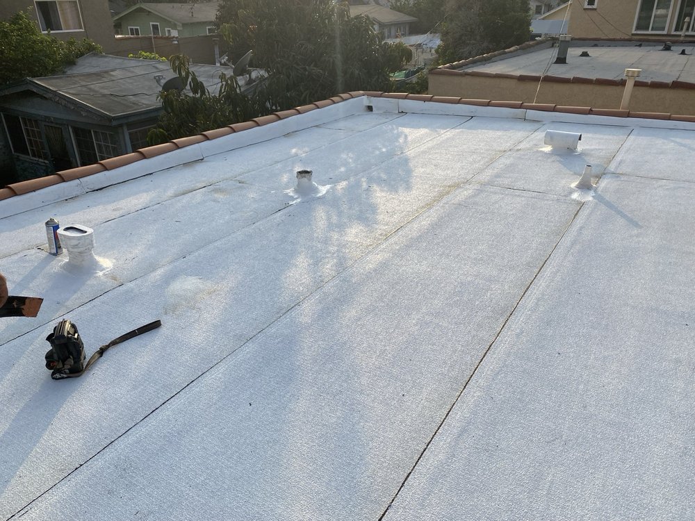 Slide of Ruiz Roofing Construction