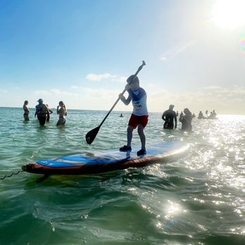 Fury Water Adventures - My son paddle boarding for the first time at the shallow sand bar. - Boating Near Me - Key West, Florida