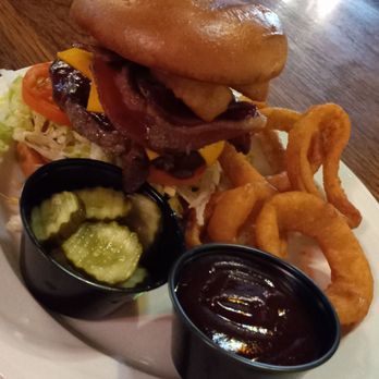 Zucchs - WESTERN BACON CHEESEBURGER $16.50 Bacon, iceberg, tomato, onion rings & side BBQ sauce & pickles - Salad Near Me - Red Oak, Texas