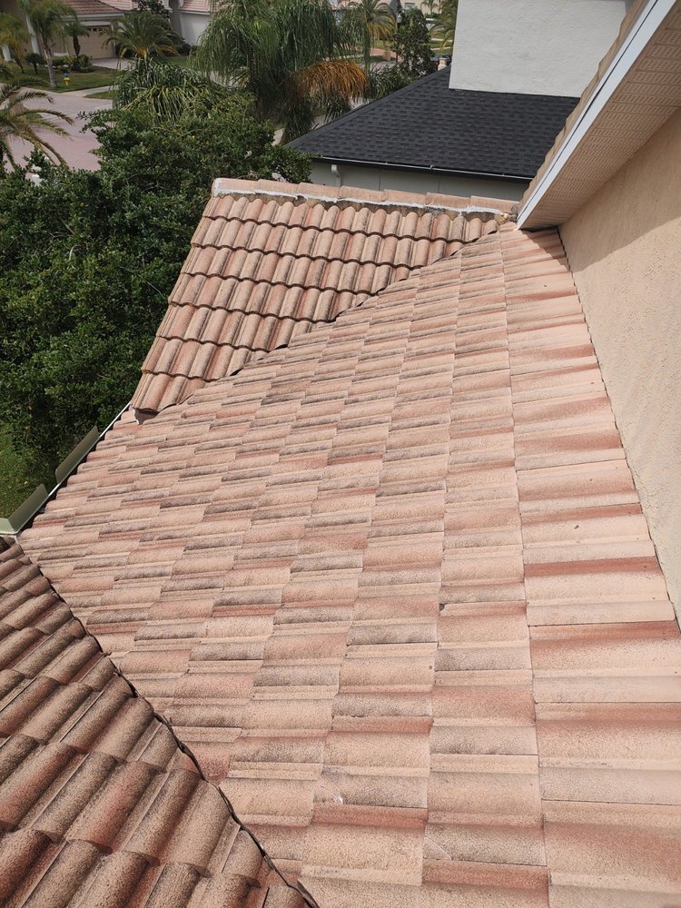 Slide of JAT Roofing