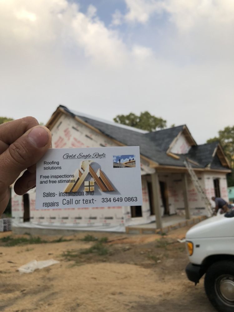 Slide of Gold Eagle Roofs