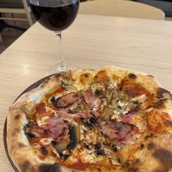 Mamma Mia - When I saw it yesterday?  I had to try it today!   This is the Bacon and Mushroom pizza.  Top 5!!