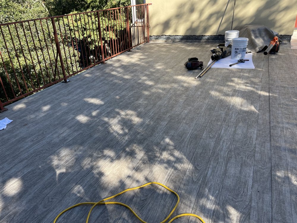 Slide of Fili's Roofing