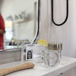 Glass of water with lemon for my son