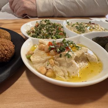 Ali Baba Grill - This was the vegetarian appetizer platter with hummus, falafel, baba ghanoush & tabouli - Mediterranean Near Me - Saint Paul, Minnesota Ali Baba Grill - This was the vegetarian appetizer platter with hummus, falafel, baba ghanoush & tabouli - Mediterranean Near Me - Saint Paul, Minnesota