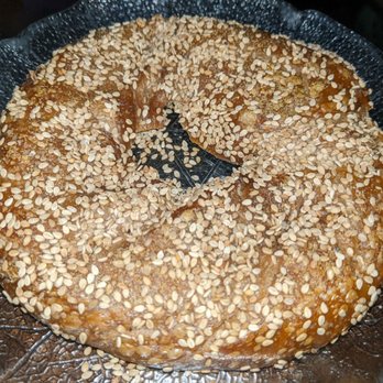 Long Island Bagel Cafe - It's Huge! Sesame whole wheat flagel - $1.85 - Bagels Near Me - Mineola, New York Long Island Bagel Cafe - It's Huge! Sesame whole wheat flagel - $1.85 - Bagels Near Me - Mineola, New York