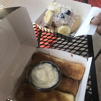Cinnaholic - Tropical Bliss Roll and Cinnasticks with marshmallow dipping sauce. - Desserts Near Me - Atlanta, Georgia Cinnaholic - Tropical Bliss Roll and Cinnasticks with marshmallow dipping sauce. - Desserts Near Me - Atlanta, Georgia