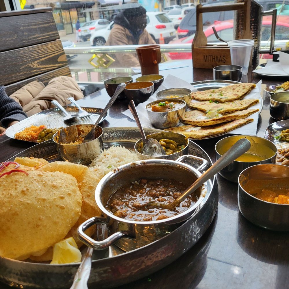 Gujarati thali and gobhi paratha Gujarati thali and gobhi paratha