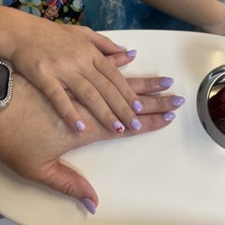 Vo's Nails & Tailoring - My daughter's and with mine.