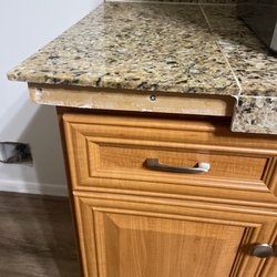 Topline Appliance and Mattress - Tile that fell out when I touched it and they did the 5 year old, glad we didn't do that.
