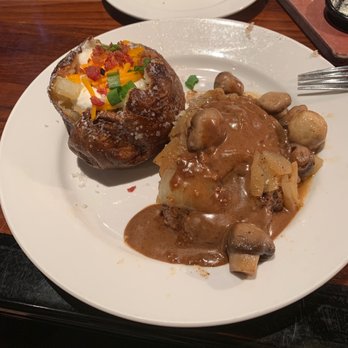 LongHorn Steakhouse - Smothered steak and a loaded baked potatoe - Steakhouses Near Me - Naples, Florida LongHorn Steakhouse - Smothered steak and a loaded baked potatoe - Steakhouses Near Me - Naples, Florida
