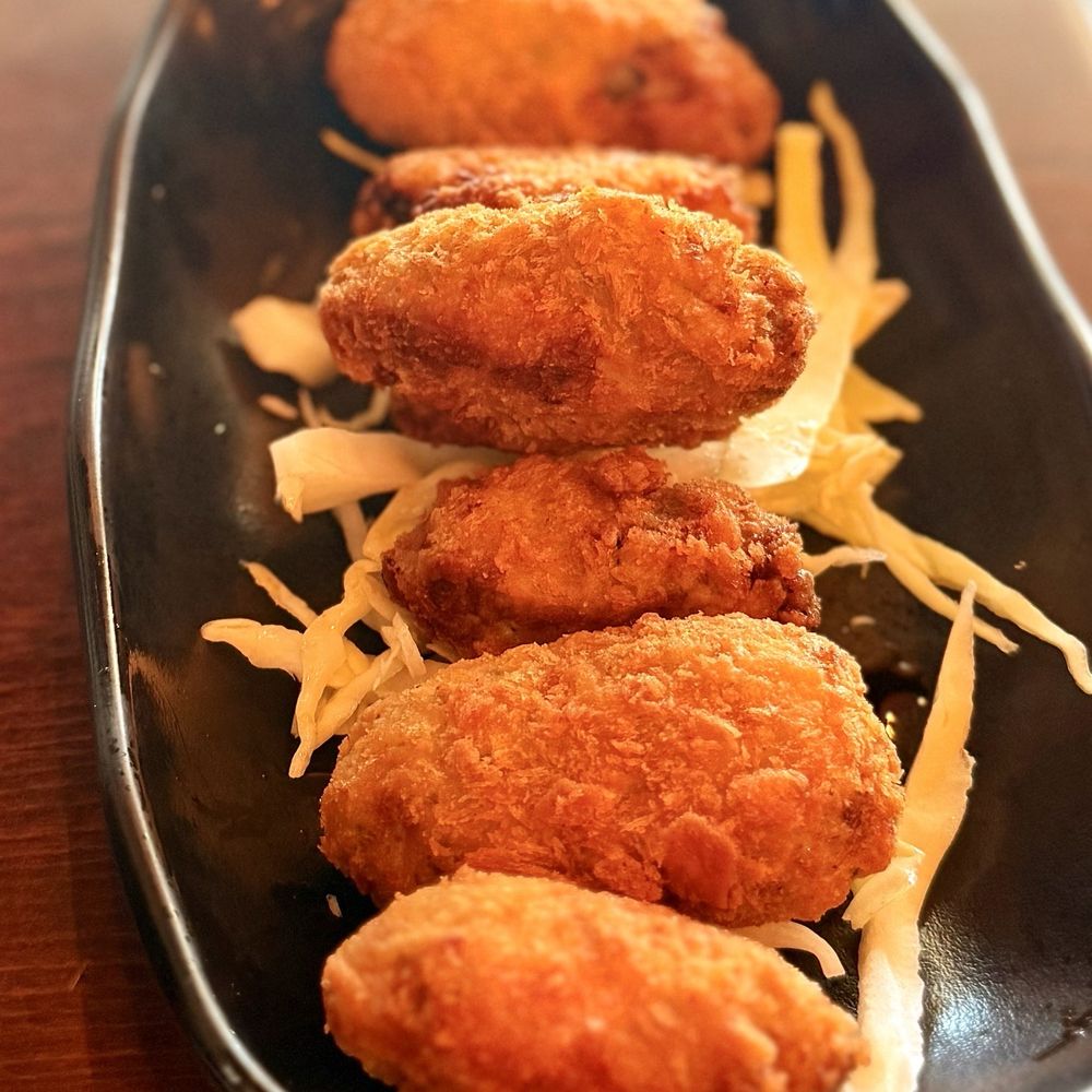 Deep fried oysters with a side of spicy mayo