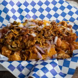 Machado Burgers - Piggy Tots! Tater Tots topped with House Made Chili, Mustard BBQ Sauce, Jalapeños, Onions and Cheese.