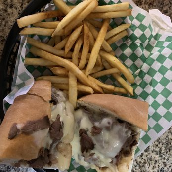 Micelis Waterfront Restaurant - French dip with a side of fries - Italian Near Me - Matlacha, Florida Micelis Waterfront Restaurant - French dip with a side of fries - Italian Near Me - Matlacha, Florida