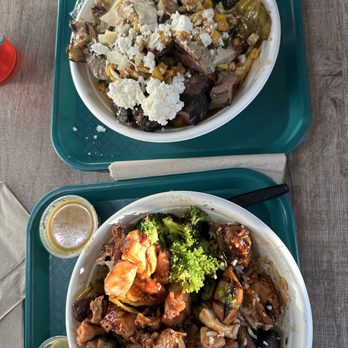 Mahana Fresh - Top: steak, chicken, rice, feta, and sides. Bottom: Teriyaki, bbq chicken, rice, noodles, and sides. - New American Near Me - Columbia, Maryland Mahana Fresh - Top: steak, chicken, rice, feta, and sides. Bottom: Teriyaki, bbq chicken, rice, noodles, and sides. - New American Near Me - Columbia, Maryland