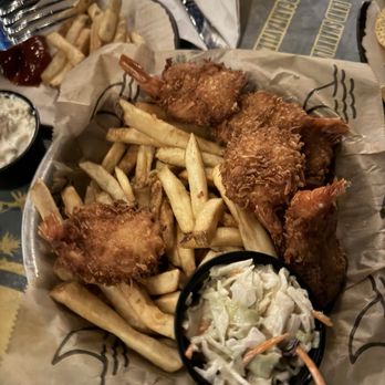 Landshark Bar & Grill - Coconut  shrimp with Pinapple aioli, mango slaw and fries. - Bars Near Me - Osage Beach, Missouri